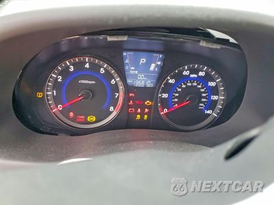 Zdjęcie 9 z 12 samochodu: 2012 HYUNDAI ACCENT VIN:KMHCU5AEXCU035095 - miniatura