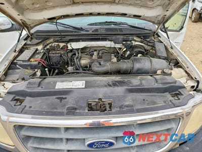 Zdjęcie 11 z 12 samochodu: 2000 FORD F150 VIN:1FTZX1722YKB29289 - miniatura