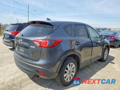 Trzecie zdjęcie samochodu z tyłu: 2016 MAZDA CX-5 TOURING VIN:JM3KE4CY8G0720229 - miniatura