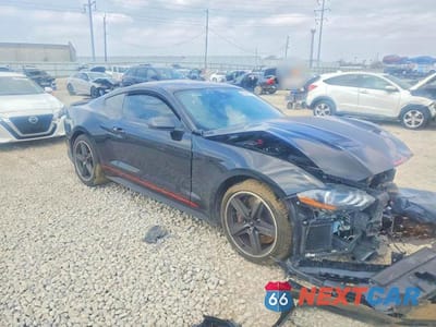 Czwarte zdjęcie samochodu z boku: 2021 FORD MUSTANG MACH I VIN:1FA6P8R04M5551991 - miniatura