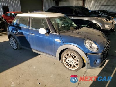 Czwarte zdjęcie samochodu z boku: 2018 MINI COOPER VIN:WMWXU1C58J2F81107 - miniatura