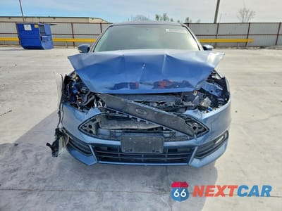 Piąte zdjęcie samochodu w środku: 2018 FORD FOCUS VIN:1FADP3L90JL289752 - miniatura