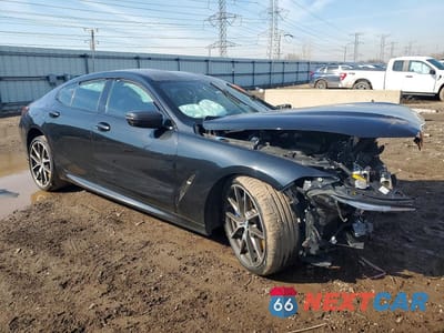 Czwarte zdjęcie samochodu z boku: 2020 BMW M850XI VIN:WBAGV8C06LCE23078 - miniatura