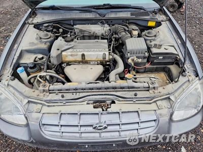 Zdjęcie 11 z 11 samochodu: 2000 HYUNDAI SONATA GL VIN:KMHWF25S6YA286680 - miniatura