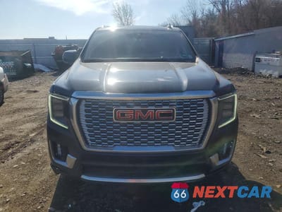 Piąte zdjęcie samochodu w środku: 2021 GMC YUKON DENALI VIN:1GKS2DKLXMR313628 - miniatura