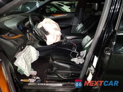 Zdjęcie 7 z 14 samochodu: 2017 LINCOLN MKC RESERVE VIN:5LMCJ3C92HUL31780 - miniatura