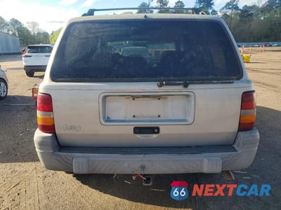 Zdjęcie 6 z 12 samochodu: 1997 JEEP GRAND CHEROKEE LAREDO VIN:1J4FX58SXVC540397 - miniatura