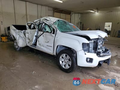 Czwarte zdjęcie samochodu z boku: 2015 GMC CANYON SLE VIN:1GTG5BE33F1129870 - miniatura