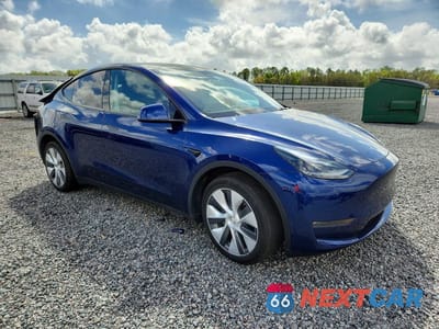 Czwarte zdjęcie samochodu z boku: 2023 TESLA MODEL Y VIN:7SAYGDEE6PA175598 - miniatura
