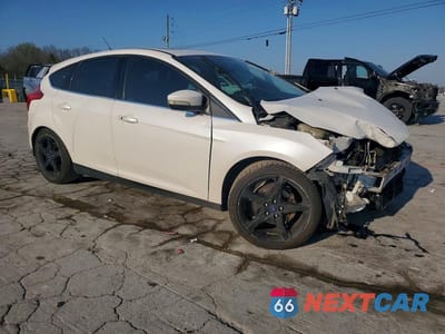 Czwarte zdjęcie samochodu z boku: 2014 FORD FOCUS TITANIUM VIN:1FADP3N27EL199827 - miniatura