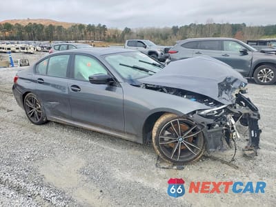 Czwarte zdjęcie samochodu z boku: 2021 BMW 330I VIN:3MW5R1J02M8C01228 - miniatura
