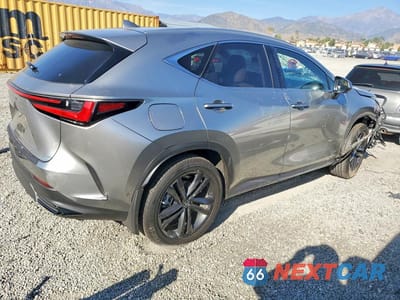 Trzecie zdjęcie samochodu z tyłu: 2025 LEXUS NX 450H+ BASE VIN:JTJHKCFZ2S2044607 - miniatura