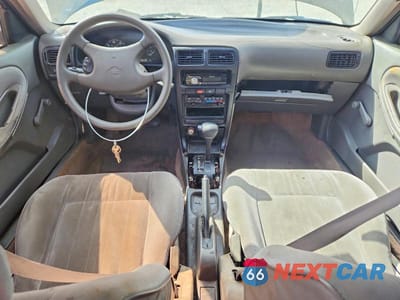 Zdjęcie 8 z 13 samochodu: 1994 NISSAN SENTRA E VIN:1N4EB31P2RC776998 - miniatura
