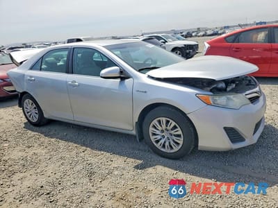 Czwarte zdjęcie samochodu z boku: 2012 TOYOTA CAMRY HYBRID LE VIN:4T1BD1FK5CU030812 - miniatura