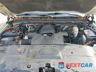 Zdjęcie 12 z 12 samochodu: 2015 GMC YUKON XL DENALI VIN:1GKS1JKJ5FR669973 - miniatura