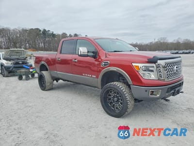 Czwarte zdjęcie samochodu z boku: 2017 NISSAN TITAN XD PLATINUM RESERVE VIN:1N6BA1F4XHN570718 - miniatura