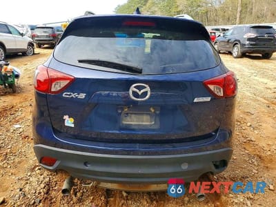 Zdjęcie 6 z 11 samochodu: 2014 MAZDA CX-5 TOURING VIN:JM3KE2CY0E0316388 - miniatura