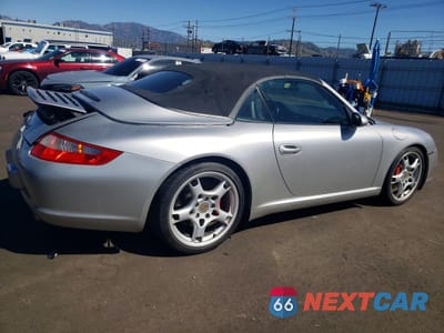 Trzecie zdjęcie samochodu z tyłu: 2006 PORSCHE 911 CARRERA S CABRIOLET VIN:WP0CB29966S766915 - miniatura