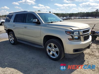 Czwarte zdjęcie samochodu z boku: 2015 CHEVROLET TAHOE C1500 LT VIN:1GNSCBKCXFR241904 - miniatura