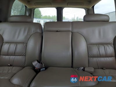 Zdjęcie 10 z 13 samochodu: 1999 CHEVROLET TAHOE C1500 VIN:1GNEC13R6XJ553695 - miniatura