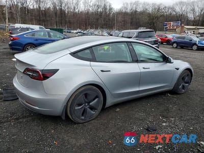 Trzecie zdjęcie samochodu z tyłu: 2018 TESLA MODEL 3 VIN:5YJ3E1EB0JF114582 - miniatura