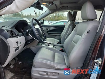 Zdjęcie 7 z 14 samochodu: 2021 HONDA PILOT VIN:5FNYF6H75MB503570 - miniatura