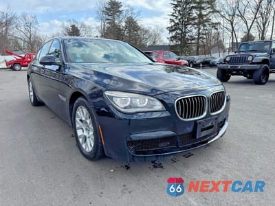 Czwarte zdjęcie samochodu z boku: 2014 BMW 750 XI VIN:WBAYB6C5XED224476 - miniatura