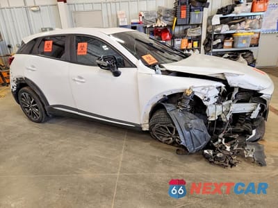 Czwarte zdjęcie samochodu z boku: 2016 MAZDA CX-3 GRAND TOURING VIN:JM1DKBD70G0113956 - miniatura