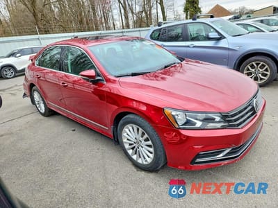Czwarte zdjęcie samochodu z boku: 2016 VOLKSWAGEN PASSAT SE VIN:1VWBT7A30GC039985 - miniatura