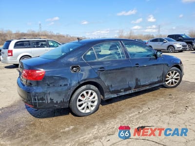 Trzecie zdjęcie samochodu z tyłu: 2011 VOLKSWAGEN JETTA SE VIN:3VWDX7AJ4BM007110 - miniatura