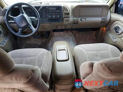 Zdjęcie 8 z 12 samochodu: 1999 GMC YUKON VIN:1GKEC13R9XJ755573 - miniatura