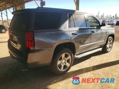 Trzecie zdjęcie samochodu z tyłu: 2016 CHEVROLET TAHOE C1500 LS VIN:1GNSCAKC4GR470879 - miniatura