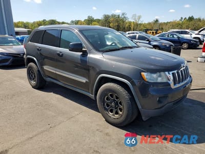 Czwarte zdjęcie samochodu z boku: 2011 JEEP GRAND CHEROKEE LAREDO VIN:1J4RS4GG2BC573408 - miniatura