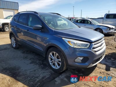 Czwarte zdjęcie samochodu z boku: 2018 FORD ESCAPE SEL VIN:1FMCU0HD4JUB09205 - miniatura