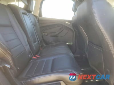 Zdjęcie 10 z 12 samochodu: 2014 FORD ESCAPE TITANIUM VIN:1FMCU0J92EUE06887 - miniatura