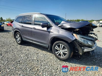 Czwarte zdjęcie samochodu z boku: 2017 HONDA PILOT EXL VIN:5FNYF5H59HB044963 - miniatura
