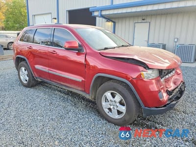 Czwarte zdjęcie samochodu z boku: 2011 JEEP GRAND CHEROKEE LAREDO VIN:1J4RR4GG6BC509304 - miniatura