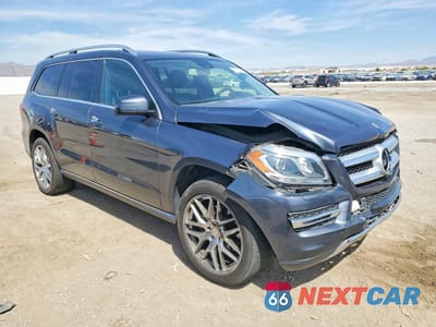 Czwarte zdjęcie samochodu z boku: 2015 MERCEDES-BENZ GL 450 4MATIC VIN:4JGDF6EE0FA575527 - miniatura