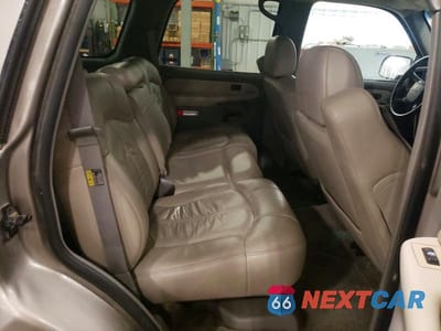 Zdjęcie 11 z 12 samochodu: 2001 CHEVROLET TAHOE K1500 VIN:1GNEK13T11J238597 - miniatura