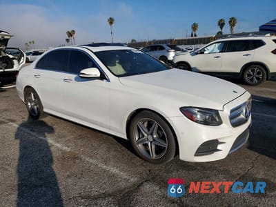 Czwarte zdjęcie samochodu z boku: 2017 MERCEDES-BENZ E 300 VIN:WDDZF4JB8HA020246 - miniatura