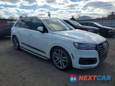 Czwarte zdjęcie samochodu z boku: 2018 AUDI Q7 PRESTIGE VIN:WA1VAAF78JD048380 - miniatura