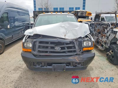 Piąte zdjęcie samochodu w środku: 2001 FORD F350 SUPER DUTY FLATBED TRUCK VIN:1FDWF36F11EC20267 - miniatura