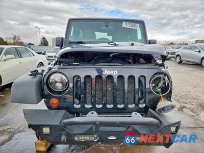 Piąte zdjęcie samochodu w środku: 2011 JEEP WRANGLER UNLIMITED RUBICON VIN:1J4HA6H11BL500695 - miniatura
