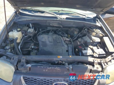 Zdjęcie 12 z 13 samochodu: 2003 FORD ESCAPE XLT VIN:1FMCU03163KA41050 - miniatura