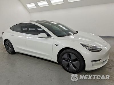 Czwarte zdjęcie samochodu z boku: 2019 TESLA MODEL 3 VIN:5YJ3E1EA3KF328328 - miniatura