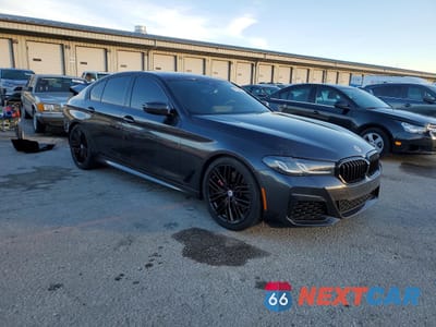 Czwarte zdjęcie samochodu z boku: 2023 BMW M550XI VIN:WBA13BK02PCM59153 - miniatura