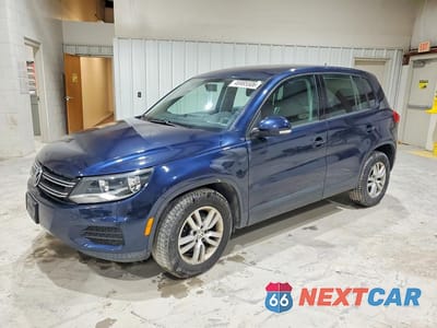 2014 VOLKSWAGEN TIGUAN S WVGBV3AX5EW611679 - główne zdjęcie licytacji z USA - miniatura