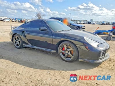 Czwarte zdjęcie samochodu z boku: 2002 PORSCHE 911 TURBO VIN:WP0AB299X2S685207 - miniatura