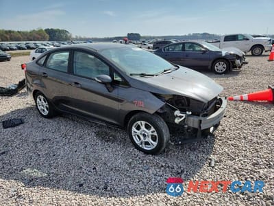 Czwarte zdjęcie samochodu z boku: 2015 FORD FIESTA SE VIN:3FADP4BJ0FM152401 - miniatura