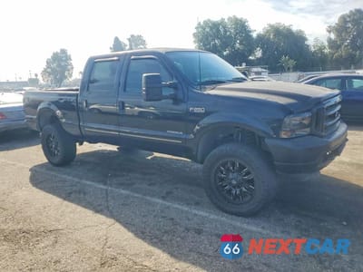 Czwarte zdjęcie samochodu z boku: 2000 FORD F250 SUPER DUTY VIN:3FTNW20F1YMA57143 - miniatura